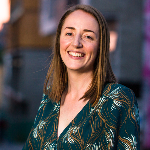 Kirsty Stark smiles in front of a blurred background